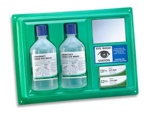 The Medical Eyewash Station includes two emergency sterile eye wash bottles, a small rectangular mirror, two eye pad dressings, and an instruction label, all housed in a green case. | Work & Wear DIrect