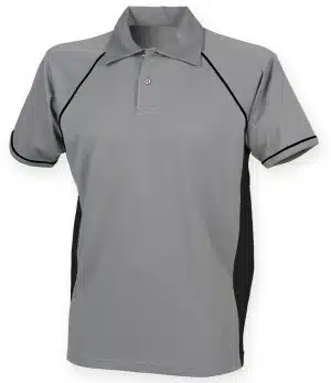 The LV370 Finden and Hales Performance Piped Polo Shirt is a plain grey, short-sleeve polo featuring a collar, black side panels, and black piping along the sleeves and shoulders. | Work & Wear DIrect