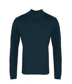 A Premier PR617 Long Sleeve Coolchecker Piqué Polo in plain dark navy blue, featuring a collar and three buttons, displayed against a white background. | Work & Wear DIrect