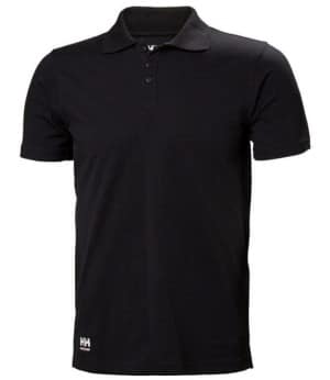 The Helly Hansen Manchester Classic Polo Shirt (79167) is a plain black short-sleeve polo featuring a collar, three-button placket, and a small white HH logo near the bottom hem on the left side. | Work & Wear DIrect