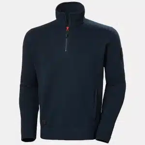 A navy blue men's pullover with a half-zip collar, orange zip pull, long sleeves, side pockets, and Helly Hansen logo on the front hem and left sleeve patch. | Work & Wear DIrect