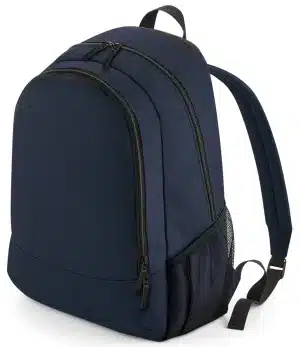A navy blue rucksack with black zips, two main compartments, a side mesh pocket, and adjustable shoulder straps. The rucksack is standing upright on a white background. | Work & Wear DIrect