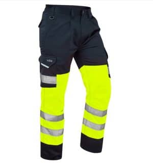 The Leo Bideford Class 1 Cargo Trouser Yellow/Navy features black upper sections with bright yellow lower legs and reflective silver stripes, designed for high visibility and safety. | Work & Wear DIrect