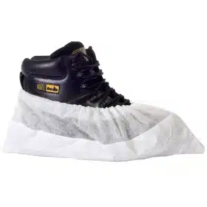 A black high-top trainer is covered with a white disposable shoe cover, often used for cleanliness in medical or cleanroom environments. | Work & Wear DIrect